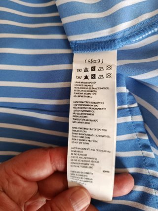 Blusa de rayas azul y blanco