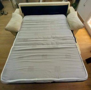 Sofá cama beige de tela