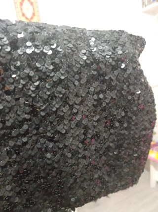 Top lentejuelas elástico negro.