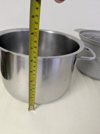 Set pentole in metallo e acciaio