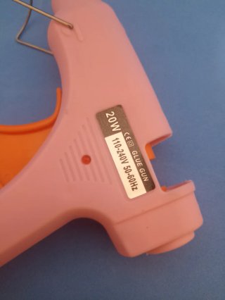 Pistola de pegamento caliente + 5 barras