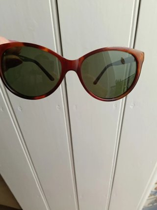 Gafas de sol  y lentes verdes