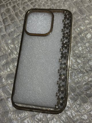 Funda iPhone 14 Pro dorada con brillantes