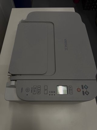 Stampante Canon con scanner grigio e bianco