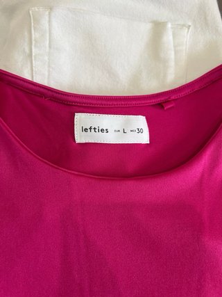 Conjunto Sra. body fucsia  y Pantalón Blanco