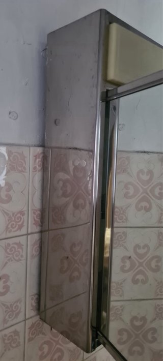 Camerino espejo vintage y silla de asistencia baño