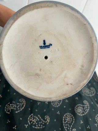 Figura de porcelana mujer con sombrero