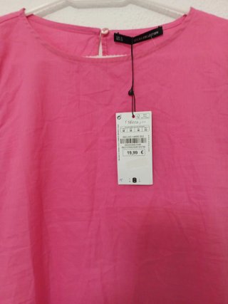 Blusa rosa con volantes