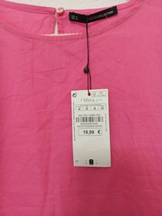 Blusa rosa con volantes