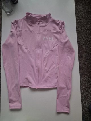 Sudadera deportiva rosa con cremallera