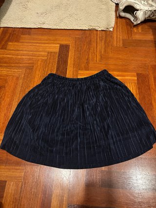 Falda plisada azul oscuro
