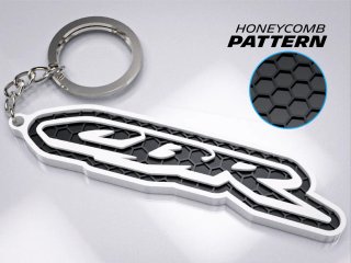 Portachiavi Honda CBR con motivo a nido d'ape
