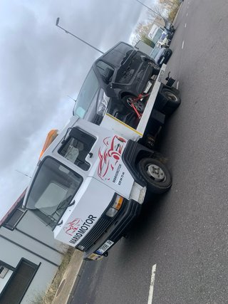 Grua porta coches nissan l35