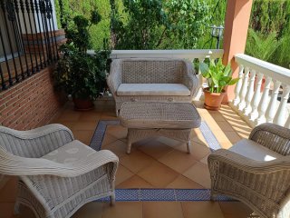Conjunto de mimbre: sofá y sillones