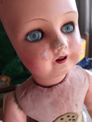 Muñeca antigua a restaurar