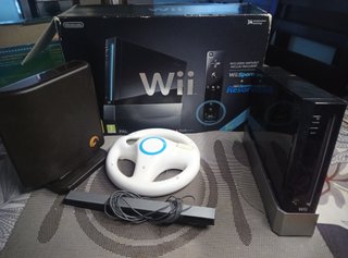 Nintendo Wii Sports Resort + Volante + disco duro