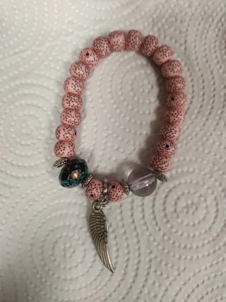 Pulsera con colgante de ala