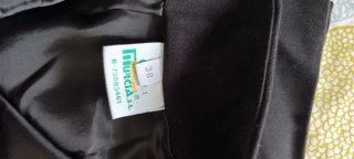 Conjunto falda y pantalón negro (tipo uniforme)