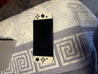 Nintendo Switch Blanca y Negra a estrenar