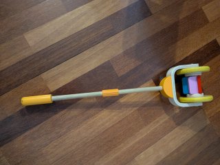 Arrastrador bebé Hape madera arcoíris