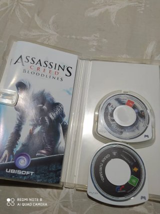 PSP Nera con Custodia e 4 Giochi