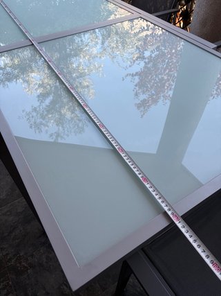 Mesa extensible cristal y 4 sillas jardín