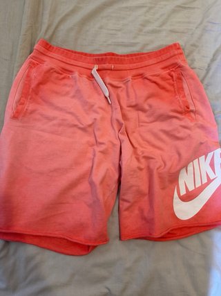 Pantalón corto Nike rosa y naranja