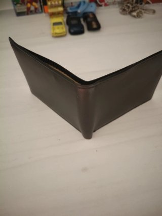 Cartera negra sin usar marca lyco