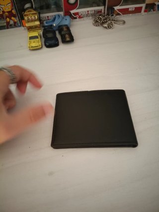 Cartera negra sin usar marca lyco