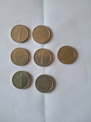 Lote 7 tokens antiguos Ilusiona colección monedas