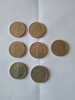 Lote 7 tokens antiguos Ilusiona colección monedas