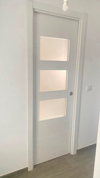 Puerta corredera con casoneto