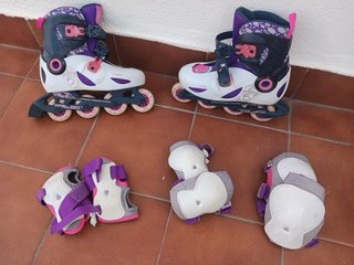 Lote de patines en línea morados y blancos