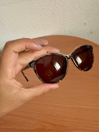 Gafas de sol Mexx azules y marrones