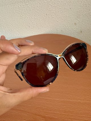 Gafas de sol Mexx azules y marrones