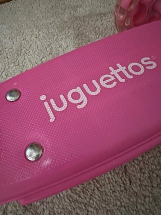 Patinete infantil rosa con cesta