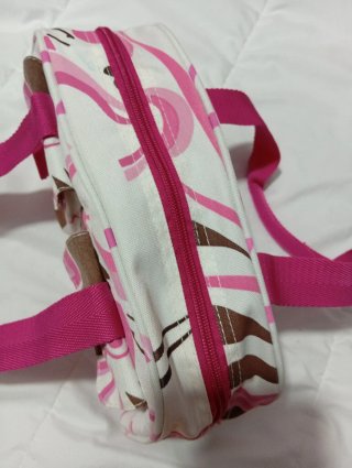 Neceser estampado rosa y marrón