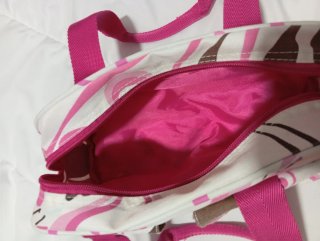 Neceser estampado rosa y marrón