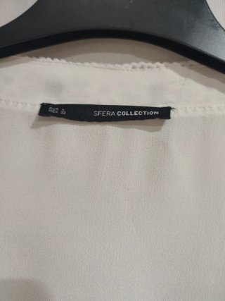 Blusa blanca con detalles