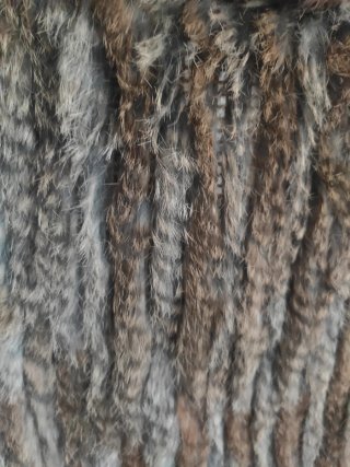 Chaleco de piel de conejo con cuello de pelo