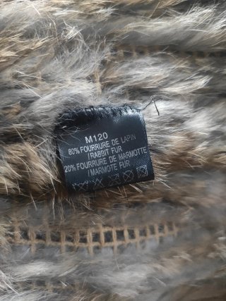 Chaleco de piel de conejo con cuello de pelo