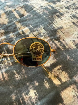 Gafas Ray-Ban Ovaladas Dorado y Negro