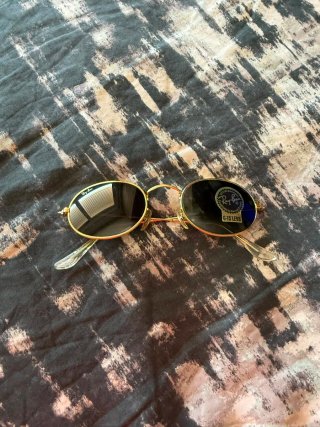 Gafas Ray-Ban Ovaladas Dorado y Negro