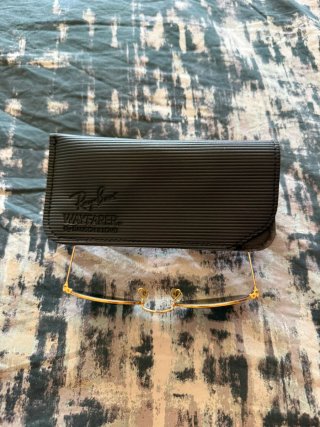 Gafas Ray-Ban Ovaladas Dorado y Negro