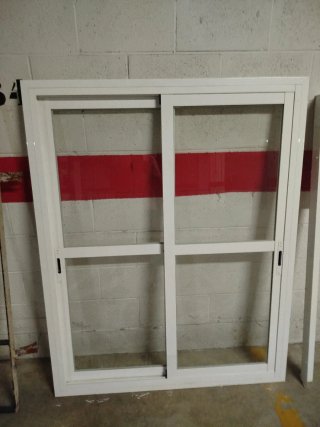Ventana aluminio y reja acero