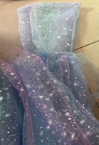 Capa de fantasía con estrellas