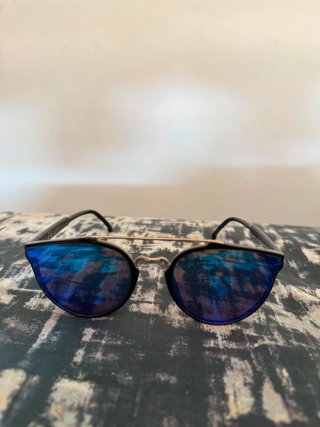 Gafas de sol Ray-Ban negras y verdes