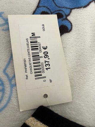 Chaqueta bomber lentejuelas doradas y negras