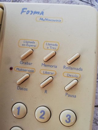 Teléfono antiguo beige