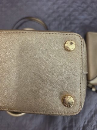 Bolso y cartera Michael Kors dorados